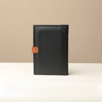 Back view of Danilos Nirua Small Portfolio Pebble Black/Tan leather organizer