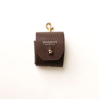 Front view of brown Airpod Case Santi Jr. leather with snap closure