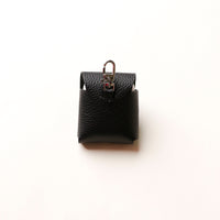 Back view of black Airpod Case Santi Jr. leather with snap closure