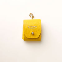 Yellow Airpod Case Santi Jr. leather with snap closure