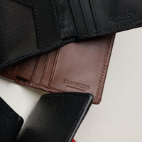 Close-up of Pebble Black & Tan Napa leather texture on Trifold Wallet