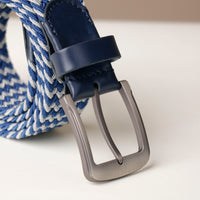 Close‑up of elastic blue belt texture and buckle