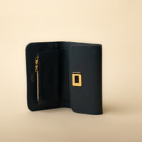 Open blue Sherlyn Wallet tri-fold leather wallet by Danilo’s