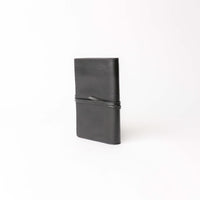 Side view of black Danilos Porta Tech New Design leather cable organizer