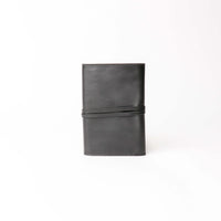 Back view of black Danilos Porta Tech New Design leather cable organizer