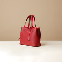 Side view of red Premium leather Boss Bag Top Handle for organized daily carry