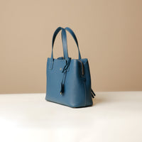 Side view of blue Premium leather Boss Bag Top Handle for organized daily carry