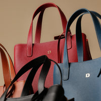 A collection of Premium leather Boss Bag Top Handle for organized daily carry