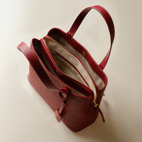 Open interior of red Premium leather Boss Bag Top Handle for organized daily carry