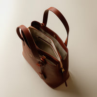 Open interior of brown Premium leather Boss Bag Top Handle for organized daily carry