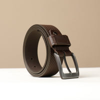 A brown leather belt with a metallic buckle, displayed against a neutral background.