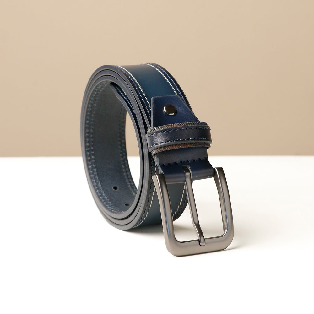 A blue double stitch belt with a metallic buckle on a light background.