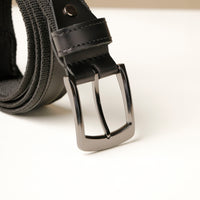 Closed Up view of Black Canvas with Leather Belt, a versatile canvas belt with leather details for casual, everyday wear