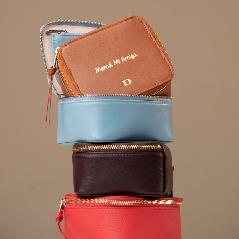 Stack of four leather Danilos jewelry organizer anushka in different colors