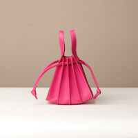 Pink Mini Papillon Bag compact leather bucket bag by Danilo’s