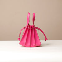 Pink Mini Papillon Bag compact leather bucket bag by Danilo’s