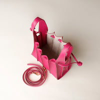 Open interior of pink Mini Papillon Bag compact leather bucket bag by Danilo’s
