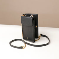 side view of a open black danilos leather multi smartphone alessia over a white background