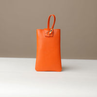 Back view of orange Leather Josephine Phone Pouch by Danilos