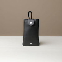 Front view of black Leather Josephine Phone Pouch by Danilos