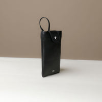 Side view of black Leather Josephine Phone Pouch by Danilos