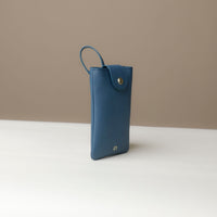 Side view of blue Leather Josephine Phone Pouch by Danilos