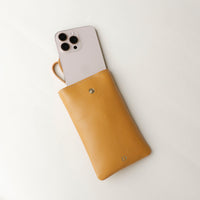 Open view of yellow Leather Josephine Phone Pouch by Danilos