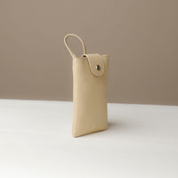 Side view of white Leather Josephine Phone Pouch by Danilos
