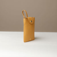 Side view of yellow Leather Josephine Phone Pouch by Danilos