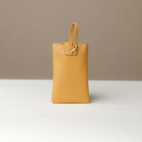 Back view of yellow Leather Josephine Phone Pouch by Danilos