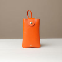 Front view of orange Leather Josephine Phone Pouch by Danilos