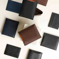 upper view of a leather Milano wallets with card case holders over a beige background