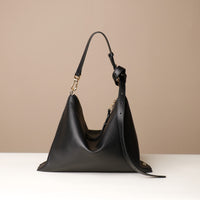Zesté Crossbody Lux in black – convertible leather shoulder and top-handle bag with adjustable strap, handcrafted by Danilo’s
