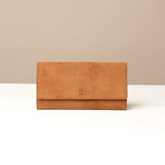 Brown suede leather Danilos wallet with a gold logo on a beige background
