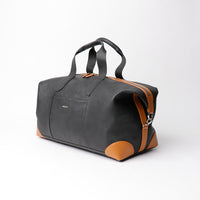 Danilos Hegarty Travel Bag Black and Brown full-grain leather with adjustable strap